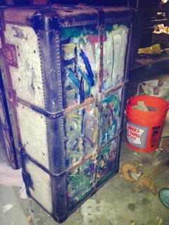 how would you clean remove paint this cloth on a steamer trunk