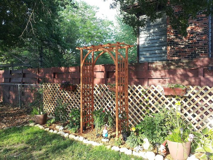 hiding unsitely fence areas, fences, outdoor living, With the Arch