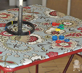 makeover a card table using a spray paint shower curtain mod podge, Old card table recreated to a fun game table