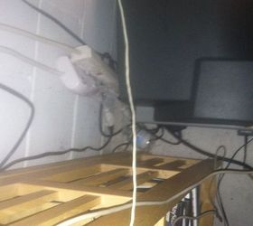 electrical safety issues in a home, electrical, several outlets and plugs along with transformers hanging down and laying on the floor and under appliances