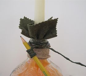 pumpkin re purpose project bottle into a pumpkin candle holder, crafts, halloween decorations, repurposing upcycling, seasonal holiday decor, Create tendrils with wire wrapped in floral tape Use 30 of wire twist around the top Twirl around a pencil to get the curly ques