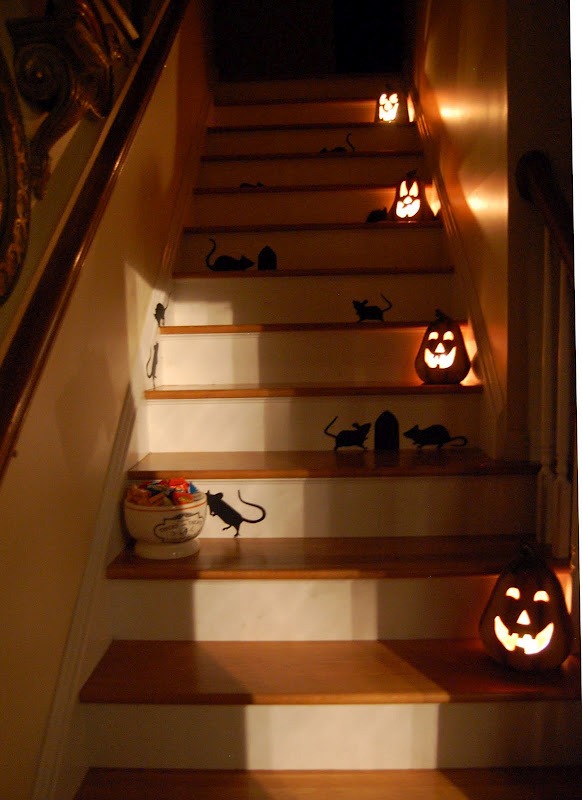 a rat infestation planning for some halloween giggles, halloween decorations, seasonal holiday d cor, Having a Halloween party Stagger glowing pumpkins down the staircase to light the way