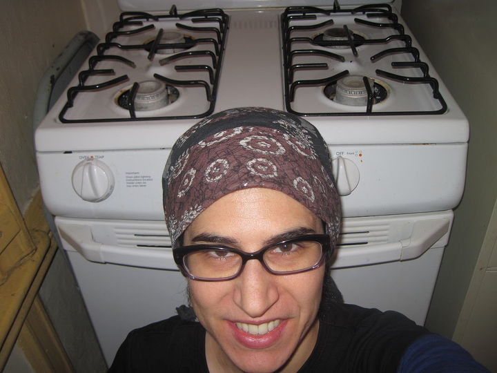 i discovered that you can clean with toothpaste see all the fun i had, bathroom ideas, Here I am in front of my clean range top I cleaned cooked on food stains with toothpaste