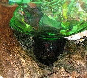 lighted gazing ball, This is how the gazing ball sits on the log No glue necessary it just rests in the crook with the stem in the hole Now I ll take some moss and cover up the transition