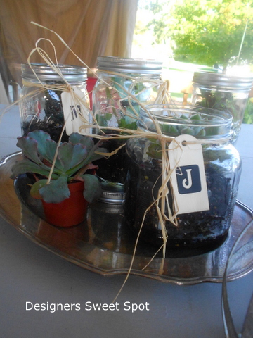 mason jar terrariums, container gardening, crafts, gardening, mason jars, repurposing upcycling, succulents, terrarium, I decorated the jars with monogrammed wooden tags and raffia bows More on the blog