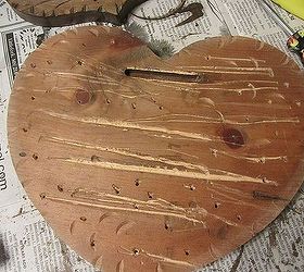 transforming country thrift shop hearts to faux reclaimed wood hearts, crafts, repurposing upcycling, seasonal holiday decor, After a lot of gouging and distressing on the BACKS of both hearts I painted on red and white paint