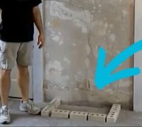 They put a square of cinder blocks on their floor for a crazy cool kitchen upgrade