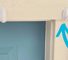 She sticks Command hooks around her door for the coolest summer trick