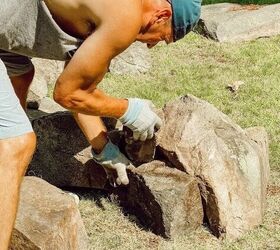 A couple stacks rocks in their backyard to create this classic backyard look