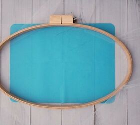 Use tulle and an embroidery hoop to create a stunning front door illusion