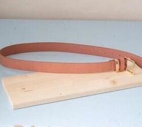 Cut up a belt to get extra storage for your walls