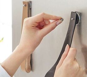 The clever reason she hangs leather loops on her wall (space-saver!)