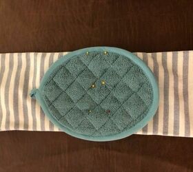 All you need is a potholder and a dish towel to copy this genius kitchen idea