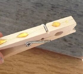 Use a few clothespins for an adorable laundry room organizing idea