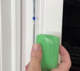 She rubs a bar of soap all over her door for this brilliant summer hack