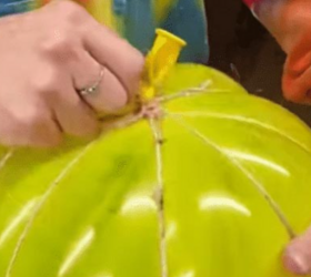 Wrap twine around a big balloon for this perfect fall idea