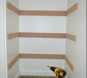 7 simple steps to create cheap easy built in closet storage, cleaning tips, closet, diy, shelving ideas, storage ideas, Third I used my drill and screwed each support piece to the wall So each shelf had three supports a piece
