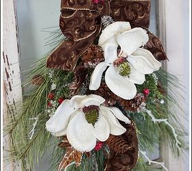 christmas door swag with magnolias, christmas decorations, seasonal holiday decor, I added brown and gold ribbon to this pine swag