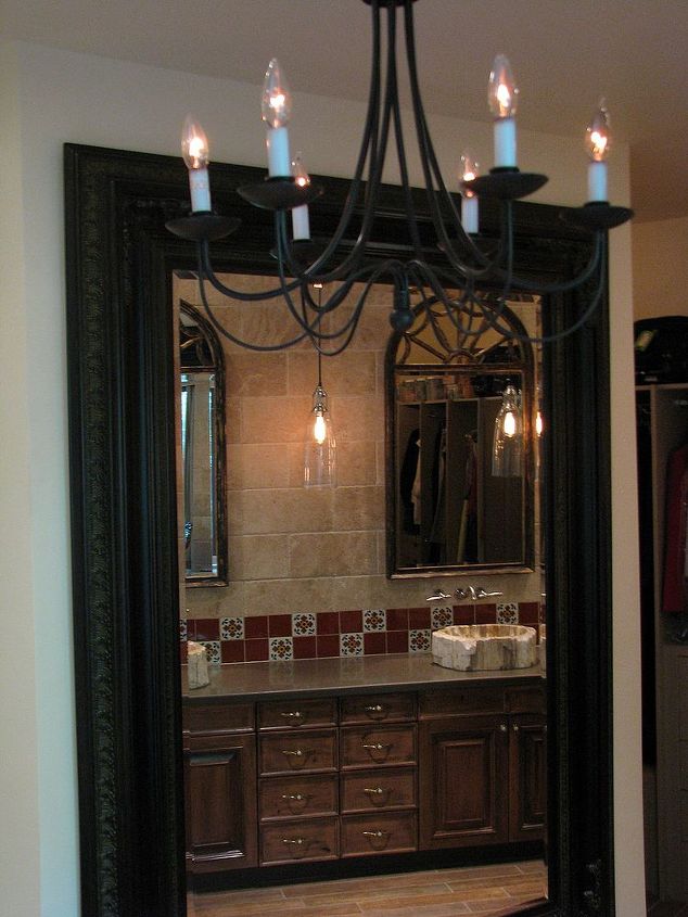 art deco master bath transforms into a spanish hacienda retreat, architecture, bathroom ideas, home decor, home improvement, This oversized wall mirror helps enlarge the feel of the new bathroom as well as hiding the new wall that encloses the walk in closet