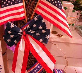 patriotic wreath tutorial, crafts, patriotic decor ideas, seasonal holiday decor, wreaths, Add bow 2 4 x6 flags with hot glue