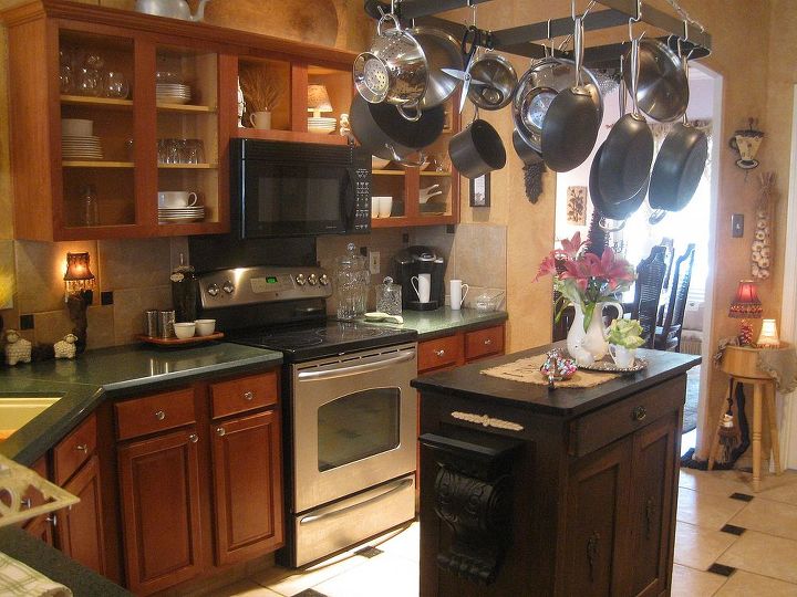 kitchen cabinet doors off or on, Top antique cream bottom the same Paint the island antique cream and leave the top black