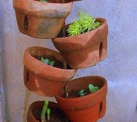 diy terra cotta pot collage, gardening, succulents, just stack them all up transplant your greens or blooms and it s ready for the yard