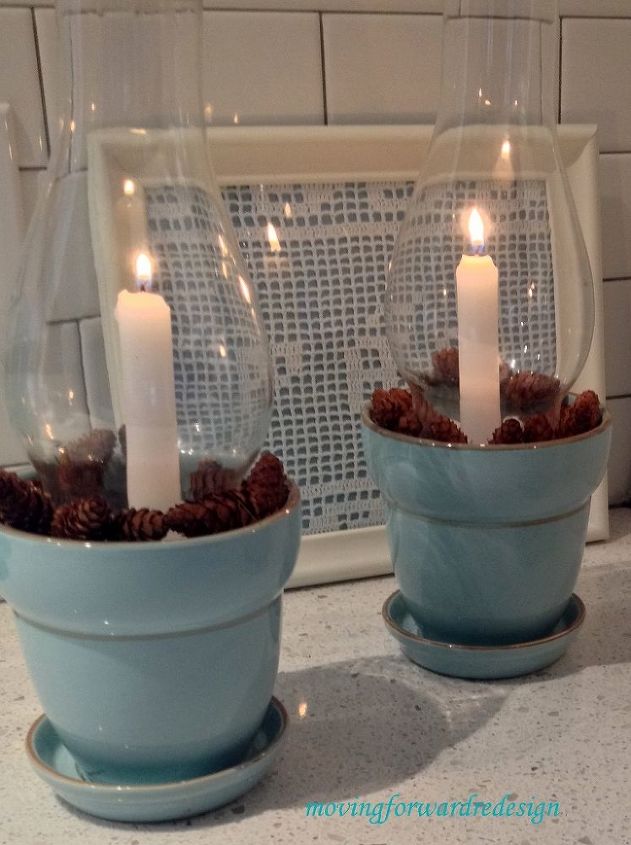 glass chimney candle holders, christmas decorations, repurposing upcycling, seasonal holiday decor, Remove pinecones and add other embellishments like sea shells in the summer and small ornaments for Christmas