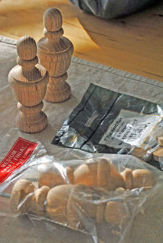 diy 1 87 kitchen cabinet feet from curtain finials, painted furniture, curtain finals turned cabinet feet