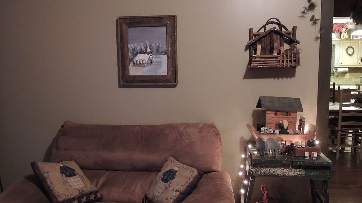 a country kind of christmas, christmas decorations, fireplaces mantels, living room ideas, seasonal holiday decor, My dad carved the noahs ark I hae several love them