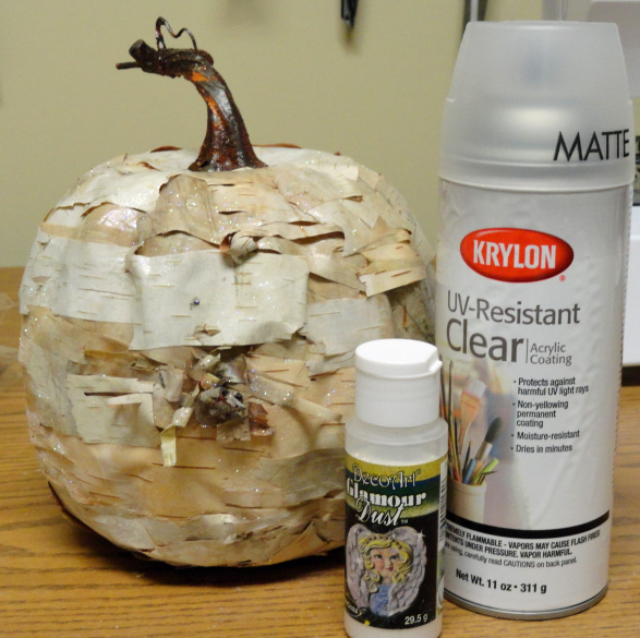 rustic birch pumpkin craft, crafts, decoupage, repurposing upcycling, seasonal holiday decor, Once the whole pumpkin is covered and dry spray the pumpkin with acrylic sealer I then also sprinkled it with glamour dust for a little sparkle