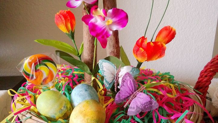 marbled easter eggs, crafts, easter decorations, seasonal holiday decor, The finished eggs nestled at the bottom of my Easter egg tree