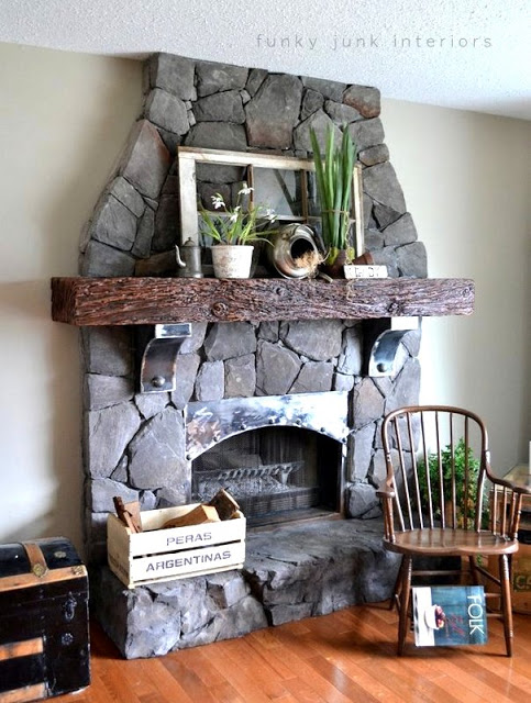 revamping an outdated brick fireplace without destruction, concrete masonry, fireplaces mantels, home decor, This floor to ceiling fireplace was created with only additions and creativity No hammer needed