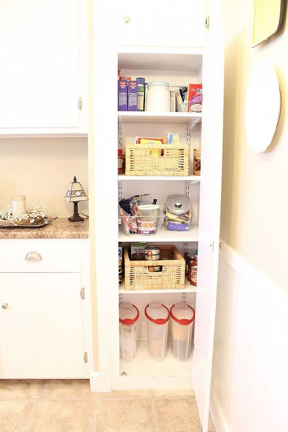 transform your broom closet into a pantry, closet, I added four shelves which keep us organized I have a larger pantry in the basement so I just keep the basics in the kitchen