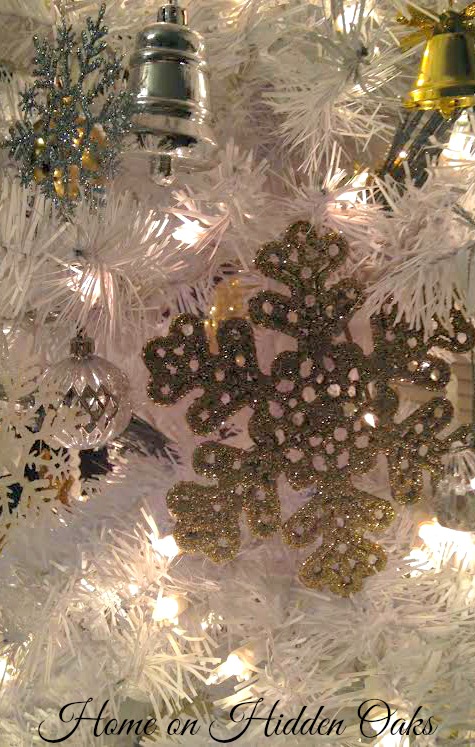 a winter white christmas tree, christmas decorations, seasonal holiday decor