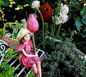 diy project mother s day fairy garden, gardening, Tulip Fairy amidst the wooly thyme lemon thyme sedums Coral Carpet and Larinem Park and Armeria Morning Star White