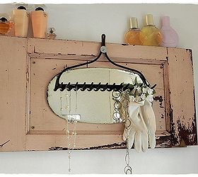 repurposed vintage bathroom, bathroom ideas, cleaning tips, organizing, painting, repurposing upcycling, An old cupboard door with original paint vintage mirror and rake mounted on top make an interesting focal point