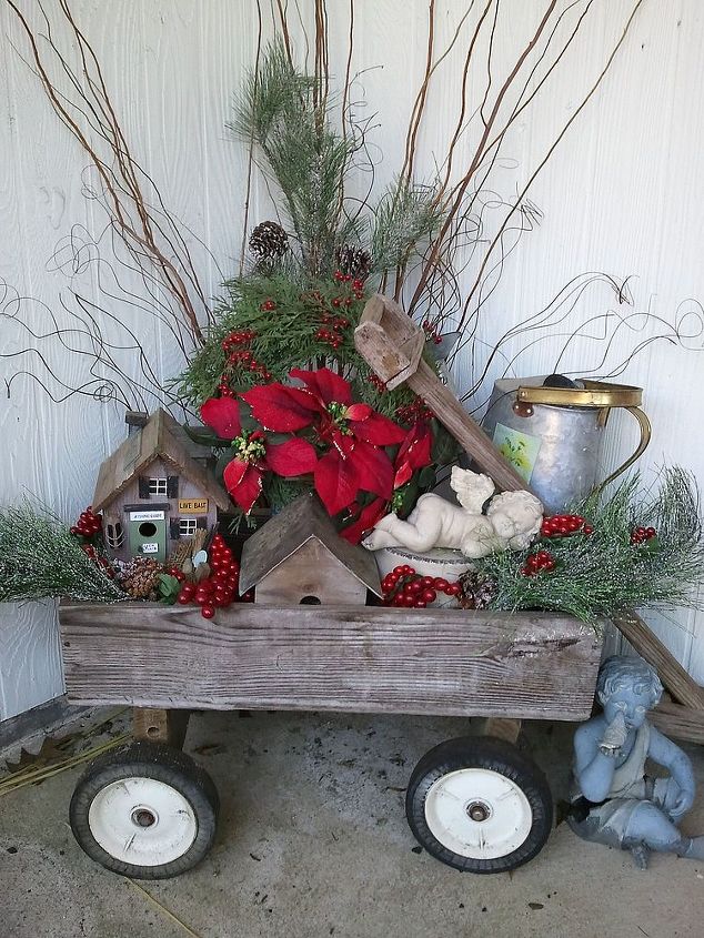 outdoor decor 3 fabulous ideas, christmas decorations, curb appeal, seasonal holiday decor, My husband got the fishing birdhouse as a retirement gift he LOVES to fish He made the other birdhouse for me with some scrap wood from leftover projects he s made several angels are some I ve had