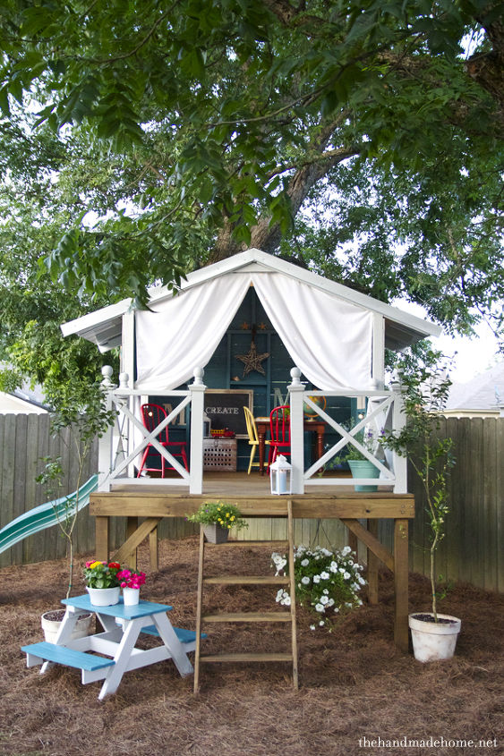 a tree house a fort or secret hideout, outdoor living, woodworking projects