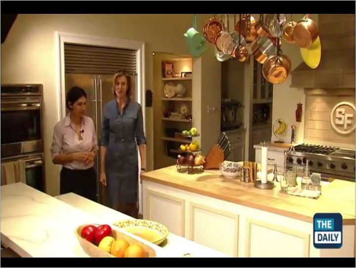 q if you lived in southfork how would you remodel this kitchen, home decor, kitchen design, When you think of decorating Dallas style you can t help but picture white columns dark rich woods paneling crystal chandeliers and a bit of gaudy opulence Given this we might have made a few different choices for the kitchen on set