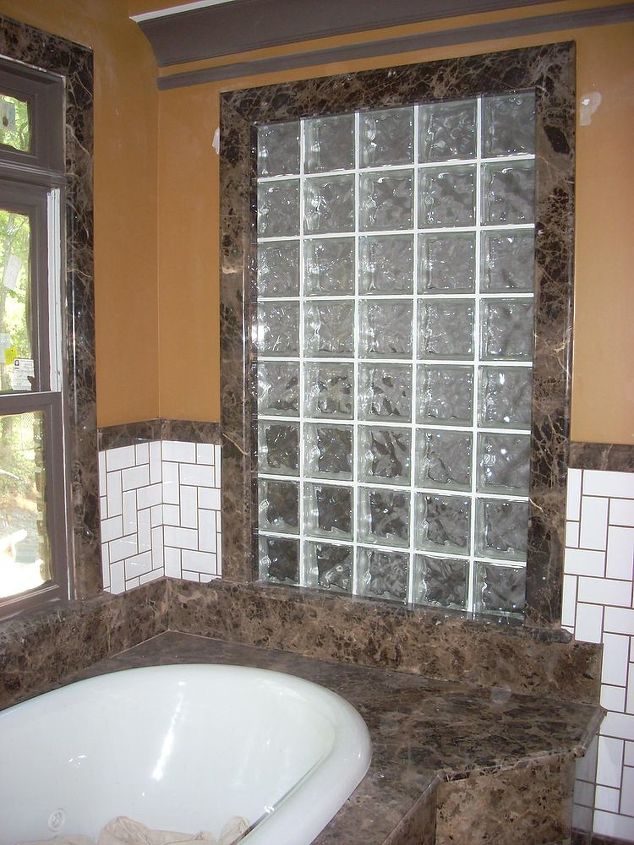 how about granite or marble window trim, bathroom ideas, home decor, windows, Dark Emperador marble tub and trim