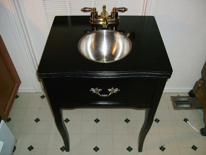 bathroom remodel using a sewing machine table for a vanity, bathroom ideas, home decor, repurposing upcycling, The new vanity The front door still opens and there s just enough room to store a few cleaning items