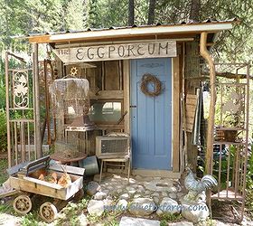 the eclectic eggporeum junk gardening at it s finest, gardening, outdoor living, Blue door lots of funky salvage to display in front what more could a junk gardener ask for