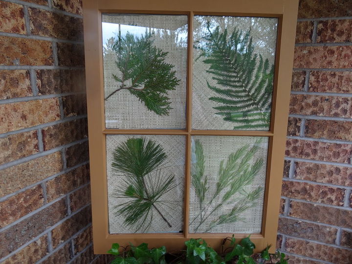 i made this from an old window and added beautiful collections from our yard, repurposing upcycling