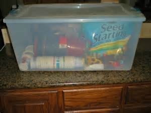 starting spring seeds indoors, container gardening, flowers, gardening, Even just a simple plastic storage container can serve as a mini greenhouse Once I have planted my morning glories and peas I am going to start some sunflowers