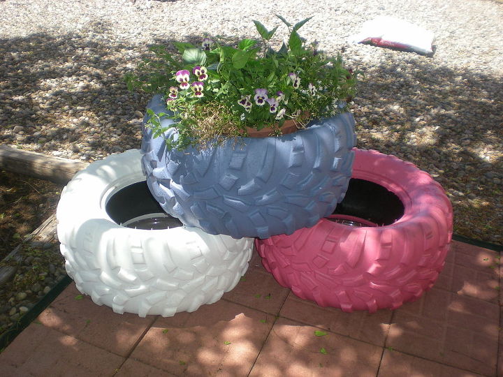 outdoor projects, gardening, home decor, patio, window treatments, the first 3 of 6 painted tire planters I need to get plants and then done Yeah