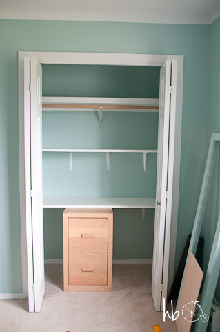 diy craft storage in a clothing closet, closet, shelving ideas, storage ideas, The bottom shelf is partially supported by a wooden file cabinet