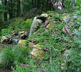 rotted retaining wall becomes and aquascape miracle project showcase how we went, decks, patio, ponds water features, pool designs, Newly landscape slope replaces old retaining wall Project by Deck and Patio Company Huntington Station New York Read more