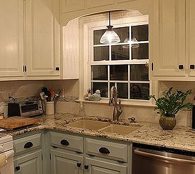 kitchen renovation, home decor, kitchen backsplash, kitchen design, New cabinet design above the sink with a pendant light addition