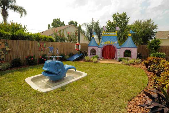 my yard goes disney farrell, outdoor living, pool designs, The new backyard includes a whale shaped fountain a nod to Tracey s love of whale watching