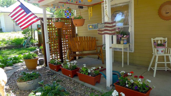 q porch in transition, diy, gardening, outdoor furniture, outdoor living, painted furniture, porches, I really really like this end of the porch The trellis defines the space